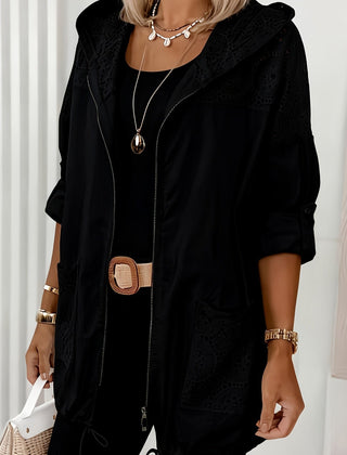Women’s Iris hooded jacket by Christine Brewer, featuring a stylish design with a zip front and adjustable hood.