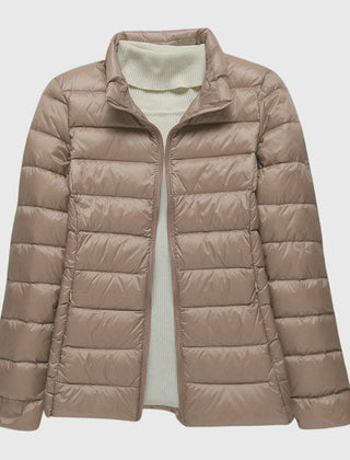 Christine Brewer Lily ultra-light quilted jacket with a sleek design and lightweight filling, perfect for layering and outdoor wear.