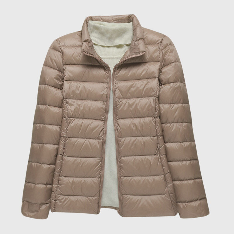 Christine Brewer Lily ultra-light quilted jacket with a sleek design and lightweight filling, perfect for layering and outdoor wear.