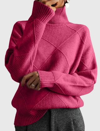Cream-colored Laura turtleneck sweater for women by Christine Brewer, featuring a cozy, fitted design and ribbed collar.
