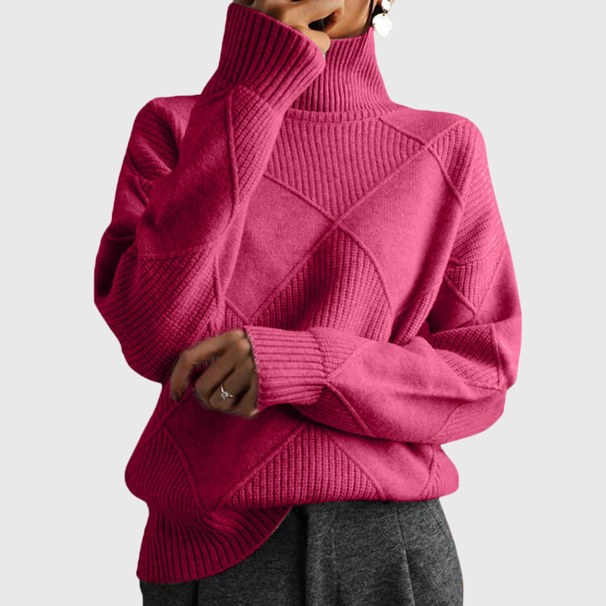 Cream-colored Laura turtleneck sweater for women by Christine Brewer, featuring a cozy, fitted design and ribbed collar.