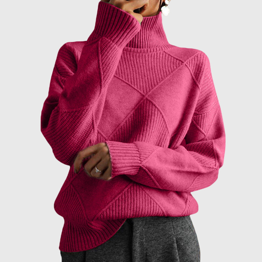 Cream-colored Laura turtleneck sweater for women by Christine Brewer, featuring a cozy, fitted design and ribbed collar.