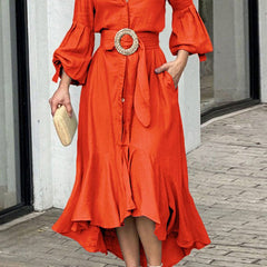 White Christine Brewer maxi dress with high-low puff sleeves, pleated design, solid color, and lapel collar.