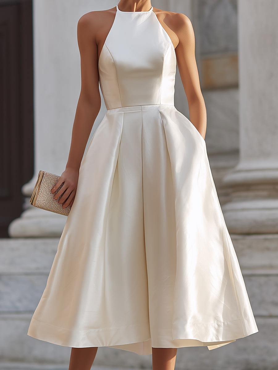 Christine Brewer women's halter-neck pleated midi dress featuring elegant flowing fabric and a stylish midi length.