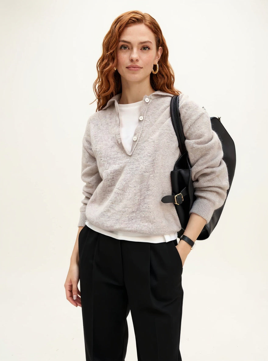 Women's wool hoodie sweater by Christine Brewer featuring a cozy, knit design with a hood and long sleeves in neutral tones.