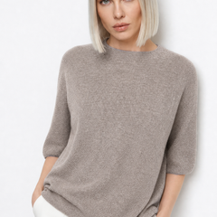 Pink wool sweater for women by Christine Brewer, featuring a cozy, classic fit with a ribbed collar and cuffs.