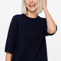 Cream-colored Frankie wool sweater for women by Christine Brewer, featuring a cozy, textured knit design.