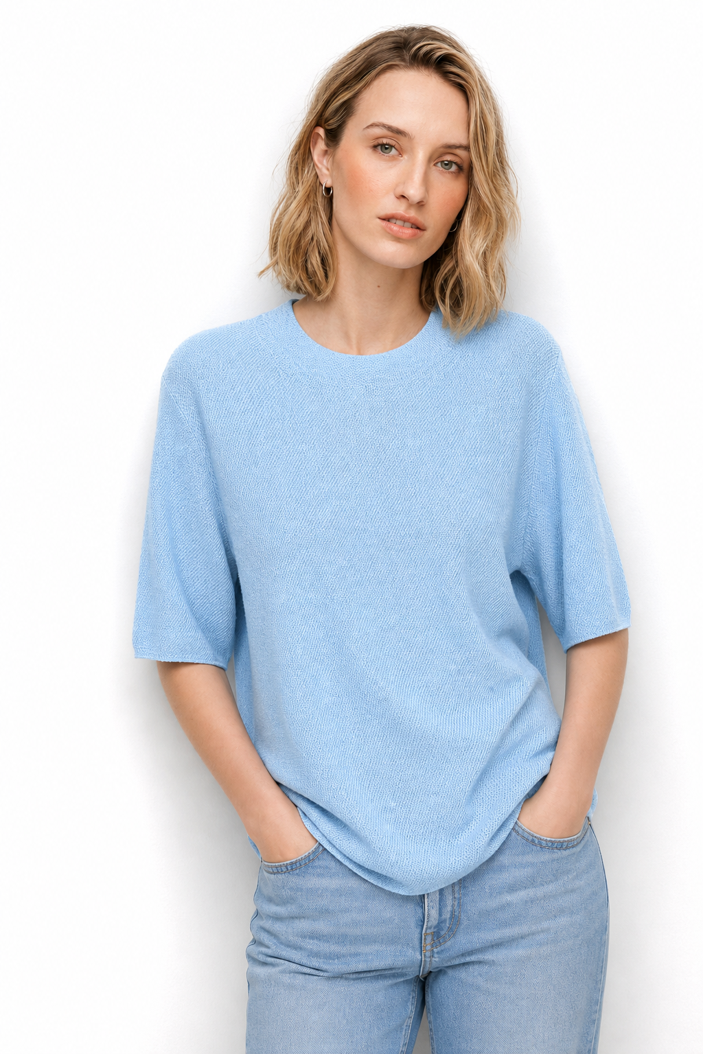 Christine Brewer Frankie wool sweater for women, cozy knit with a relaxed fit and ribbed cuffs, in neutral tones.