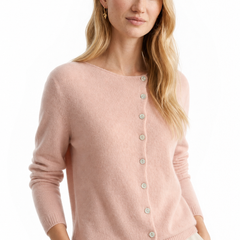 Pink knit sweater for women by Christine Brewer featuring a cozy, stylish design with a round neckline and long sleeves.