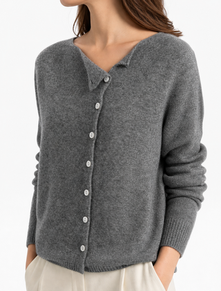 Dorothy knit sweater for women by Christine Brewer, featuring a cozy design in soft fabric, shown laid flat.