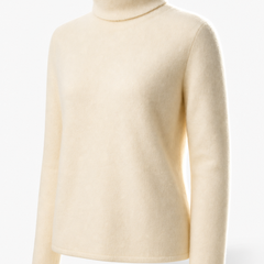 Cream-colored cashmere turtleneck sweater for women from Christine Brewer, showcasing a cozy, stylish fit and soft fabric.