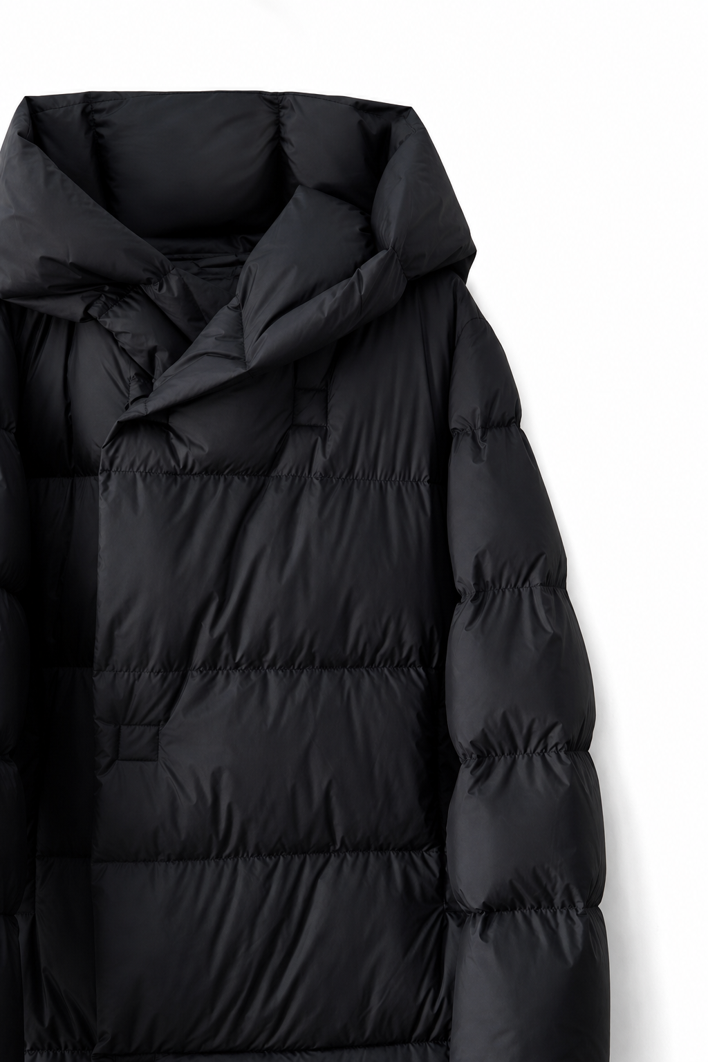 Long hooded women's parka by Christine Brewer with a sleek design, featuring a cozy hood and stylish silhouette.