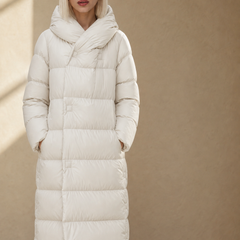 Long hooded parka for women from Christine Brewer, featuring a stylish design, warm lining, and a comfortable, casual fit.