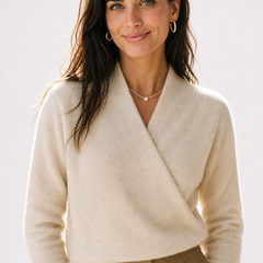 Cream-colored Christine Brewer Gwen Cashmere V-Neck Sweater for women, soft knit fabric, close-up of the cozy sweater.