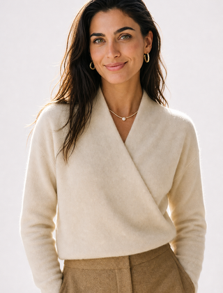Cream-colored Christine Brewer Gwen Cashmere V-Neck Sweater for women, soft knit fabric, close-up of the cozy sweater.