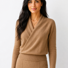 Cream-colored Helen cashmere sweater for women by Christine Brewer, featuring a cozy, soft knit with a relaxed fit.