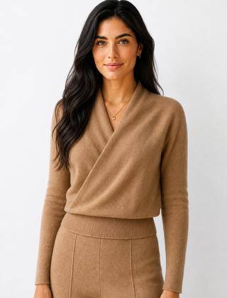 Cream-colored Helen cashmere sweater for women by Christine Brewer, featuring a cozy, soft knit with a relaxed fit.