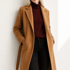 Olivia long belted wool coat for women by Christine Brewer, featuring a tailored fit and classic design in neutral wool fabric.