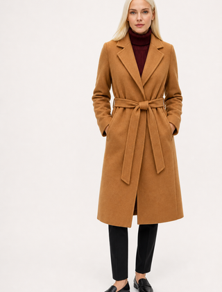Olivia long belted wool coat for women by Christine Brewer, featuring a classic design and tailored fit in neutral fabric.