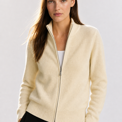 Wool zip-up cardigan for women by Christine Brewer, featuring a classic jean style with a front zipper and cozy knit fabric.