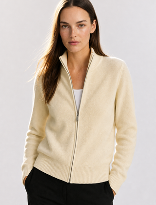 Wool zip-up cardigan for women by Christine Brewer, featuring a classic jean style with a front zipper and cozy knit fabric.