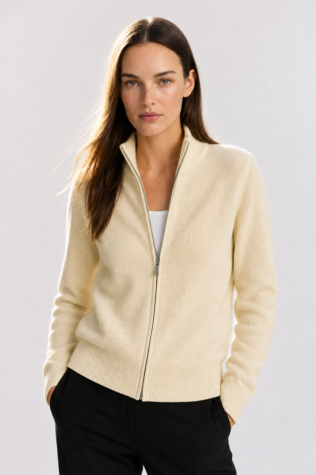Wool zip-up cardigan for women by Christine Brewer, featuring a classic jean style with a front zipper and cozy knit fabric.