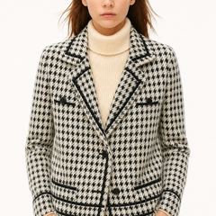 Isabella Christine Brewer women's cropped double-breasted knit cardigan with long sleeves and button details, in soft neutral tones.