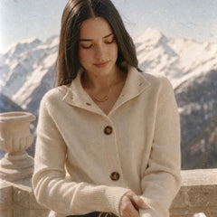 Christina Christine Brewer women's cashmere high neck cardigan, soft beige color, close-up of knit fabric and high neckline.