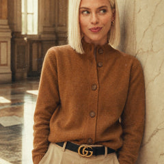 Christina Christine Brewer women's cashmere high neck cardigan in a soft, cozy knit, shown in a natural pose.