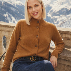 Christina Christine Brewer women's cashmere high neck cardigan, soft beige, cozy knit with long sleeves and button closure.