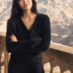 Oversized Christine Brewer cashmere cardigan for women, soft and cozy with a relaxed fit, in a neutral color.