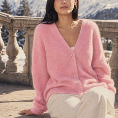 Oversized cashmere cardigan for women by Christine Brewer, featuring soft cream fabric and relaxed fit, perfect for cozy layering.