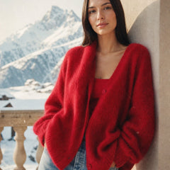 Oversized Christine Brewer cashmere cardigan for women, soft beige color, with relaxed fit and cozy knit texture.