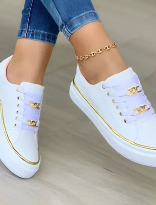 Comfortable orthopedic women’s sneakers by Christine Brewer featuring stylish design and supportive soles for walking.