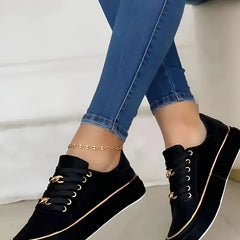 Stylish orthopedic women’s sneakers by Christine Brewer, featuring comfortable design and supportive walking sole.