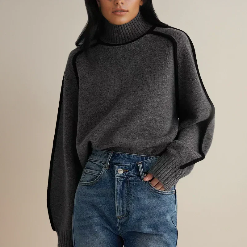 Christine Brewer Eva loose fit roll neck sweater, tailored chic clothing in soft fabric, shown in a relaxed, stylish fit.