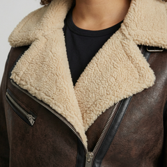Eleanor faux leather moto jacket for women by Christine Brewer, featuring classic design and silver hardware details.