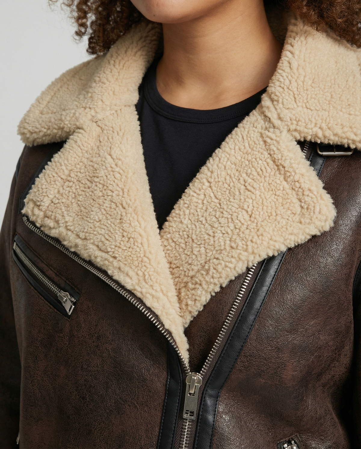 Eleanor faux leather moto jacket for women by Christine Brewer, featuring classic design and silver hardware details.