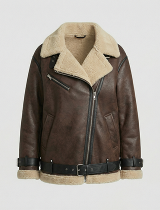 Brown faux leather moto jacket for women by Christine Brewer, featuring a stylish collar and zip details.