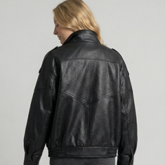 Willow asymmetric faux leather jacket for women by Christine Brewer, featuring a stylish, modern design and sleek black finish.