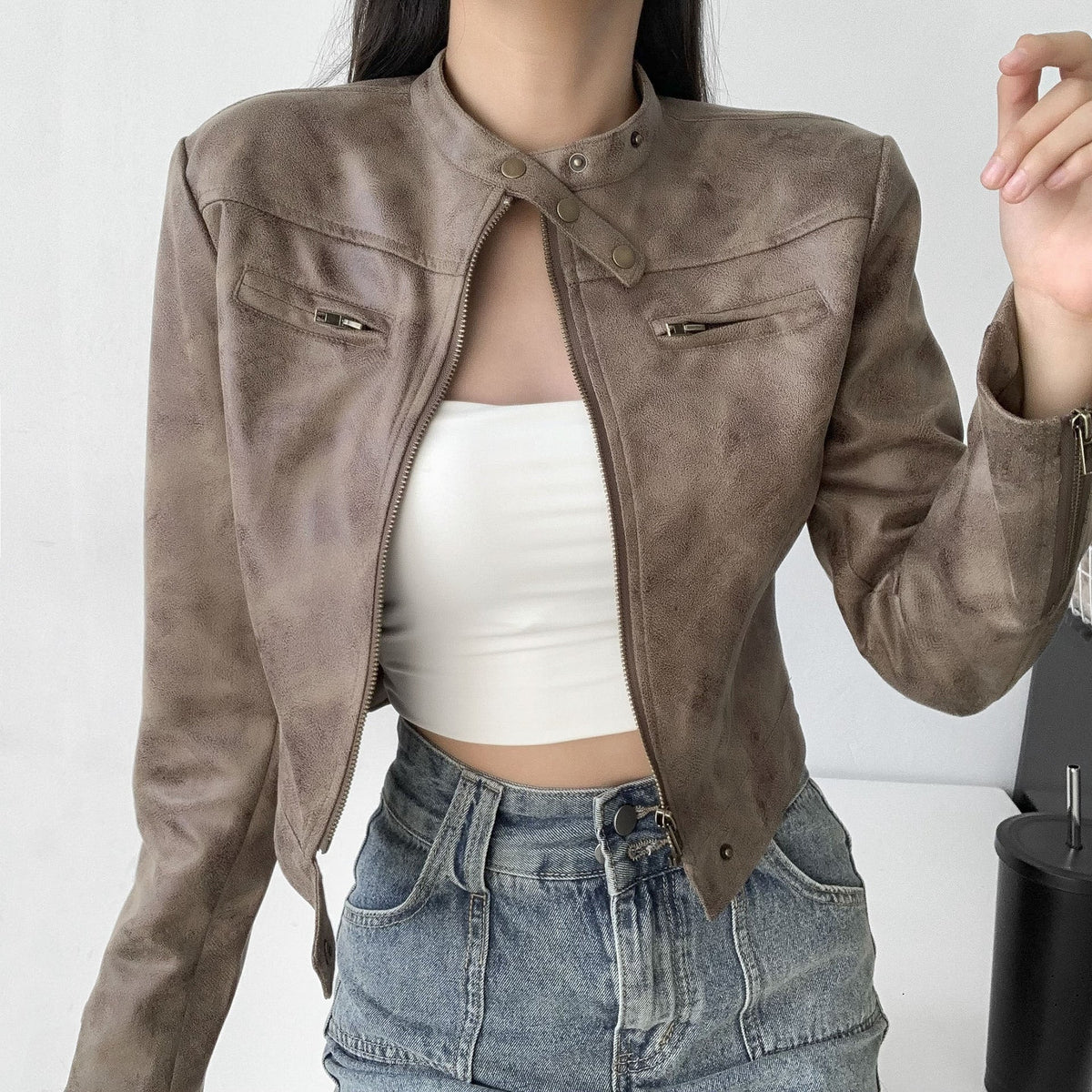 Isla cropped faux leather jacket for women by Christine Brewer, featuring a stylish fitted design and classic collar detail.