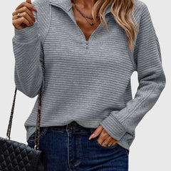 Christine Brewer Ruth women's half-zip sweater in cozy knit, featuring a high collar and ribbed cuffs, in a stylish neutral tone.