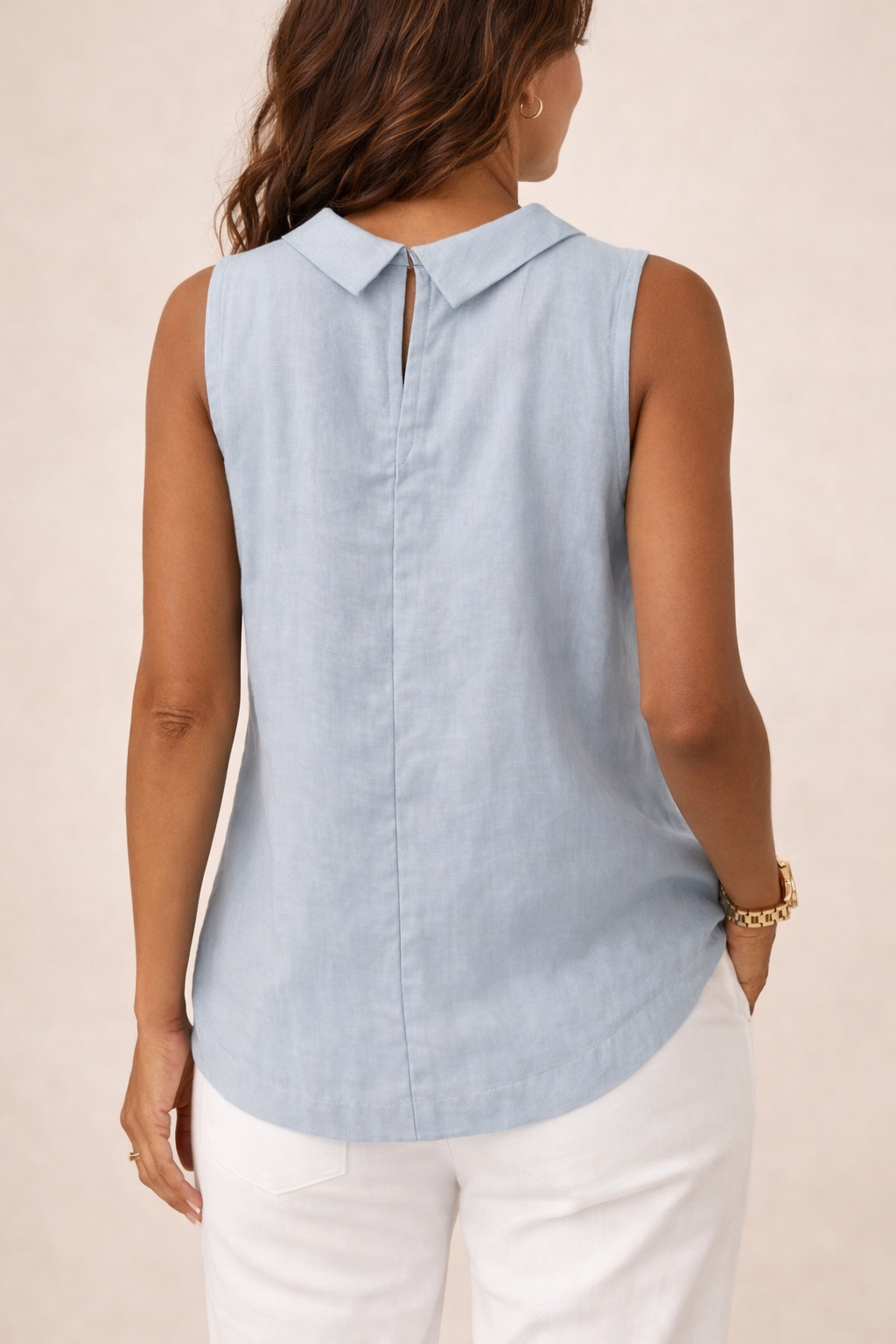 Emily sleeveless knit tank top for women by Christine Brewer, shown in a casual fit with a round neckline and sleeveless design.