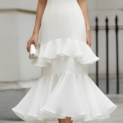 Sleeveless tiered ruffle midi dress by Christine Brewer, featuring layered fabric and feminine design.