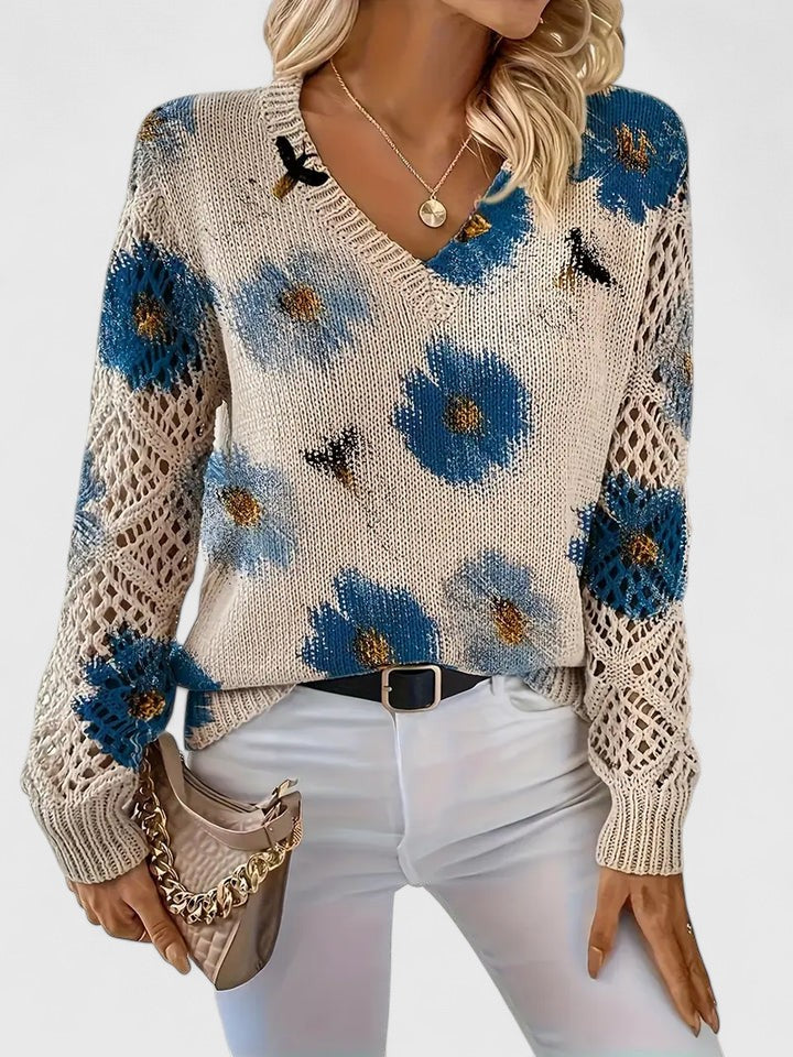 Whitney floral V-neck cardigan for women by Christine Brewer, featuring a colorful floral pattern and lightweight knit fabric.