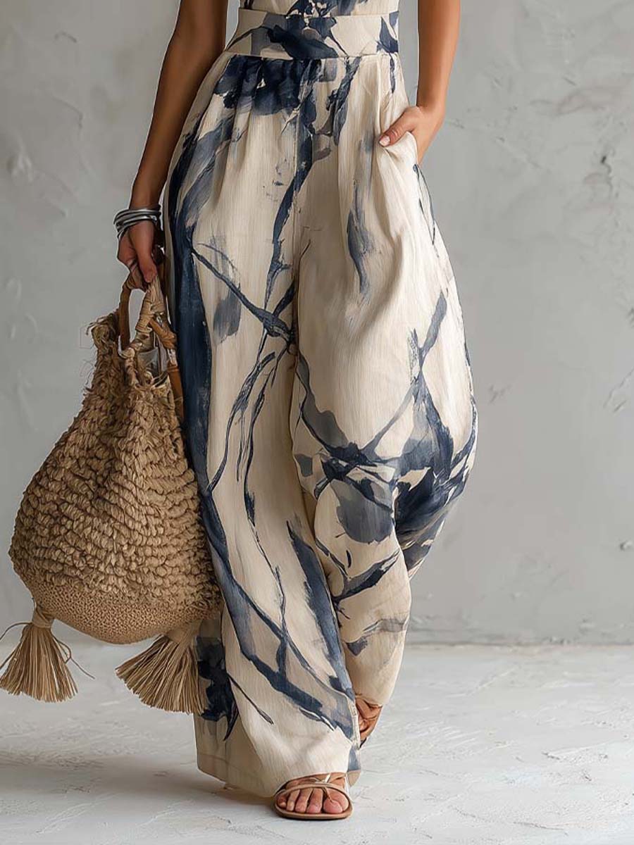 White ink wash print halter neck wide-leg jumpsuit for women with pockets, by Christine Brewer, featuring a stylish and comfortable design.