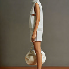 Retro sporty grey and white sleeveless sweatshirt and shorts set by Christine Brewer, featuring a half-zip design and casual fit.