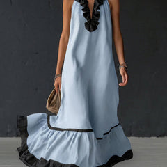 A-Line loose maxi dress by Christine Brewer featuring contrast color pleats, ruffle trim, split-joint V-neck, and elegant flowy design.