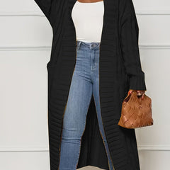 Sadie asymmetric knit cardigan for women by Christine Brewer, featuring a stylish, cozy coat with a unique design and textured fabric.