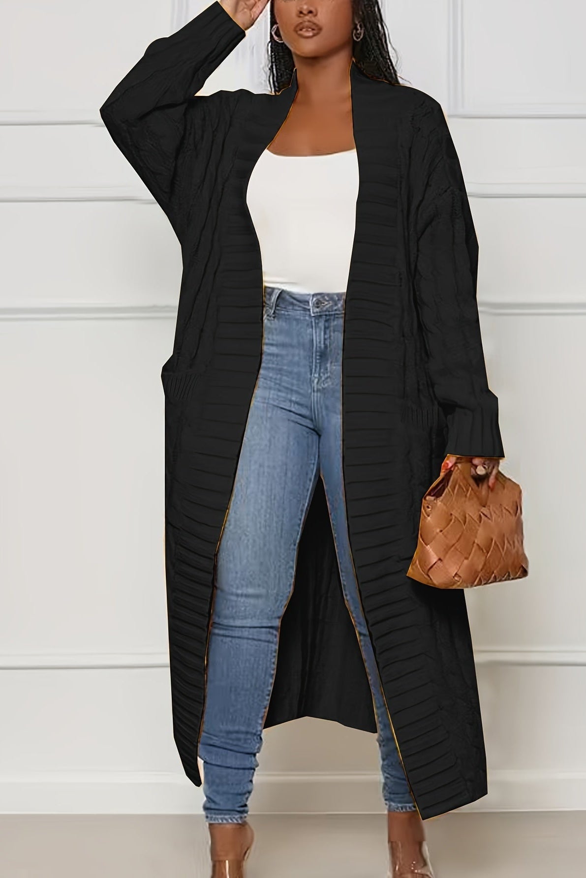 Sadie asymmetric knit cardigan for women by Christine Brewer, featuring a stylish, cozy coat with a unique design and textured fabric.